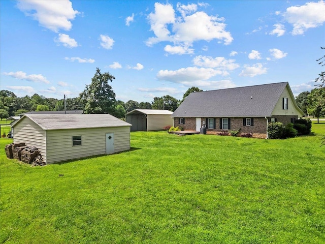 298 Askew, Union, SC 29379 - view of green lawn with a carport and a storage shed