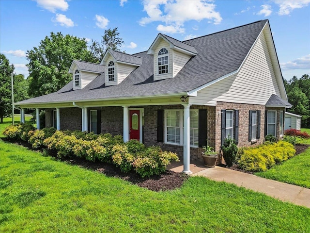 298 Askew, Union, SC 29379 - cape cod home with a front yard, a porch, and brick siding