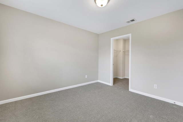 463 Lynnell, Moore, SC 29369 - unfurnished bedroom with carpet, a spacious closet, and a closet