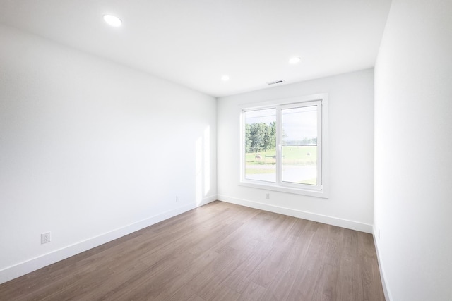 634 N Green Riv, Gaffney, SC 29341 - empty room with wood finished floors and recessed lighting