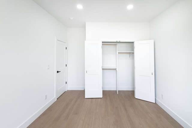 634 N Green Riv, Gaffney, SC 29341 - unfurnished bedroom featuring light wood-style flooring, recessed lighting, and a closet