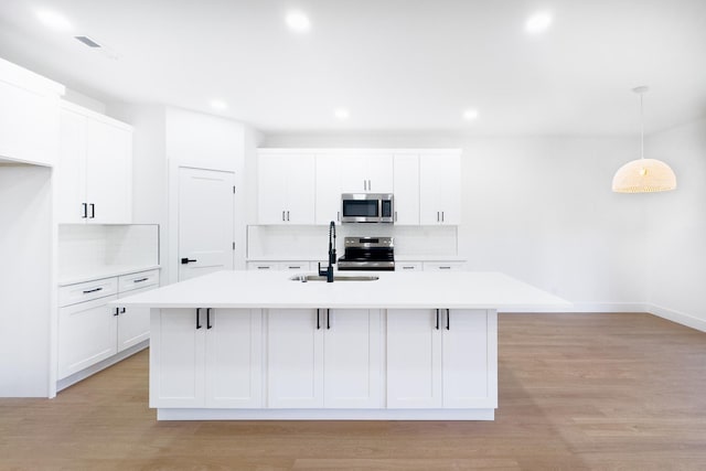 634 N Green Riv, Gaffney, SC 29341 - kitchen with appliances with stainless steel finishes, tasteful backsplash, light countertops, and recessed lighting