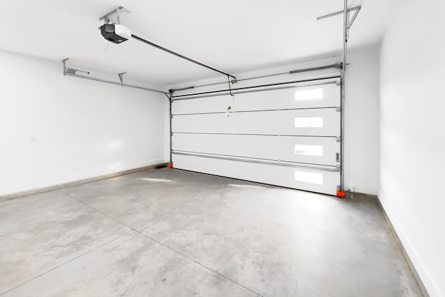 634 N Green Riv, Gaffney, SC 29341 - garage with a garage door opener and baseboards