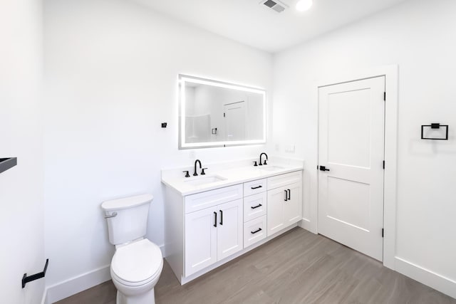 634 N Green Riv, Gaffney, SC 29341 - bathroom featuring wood finished floors and double vanity