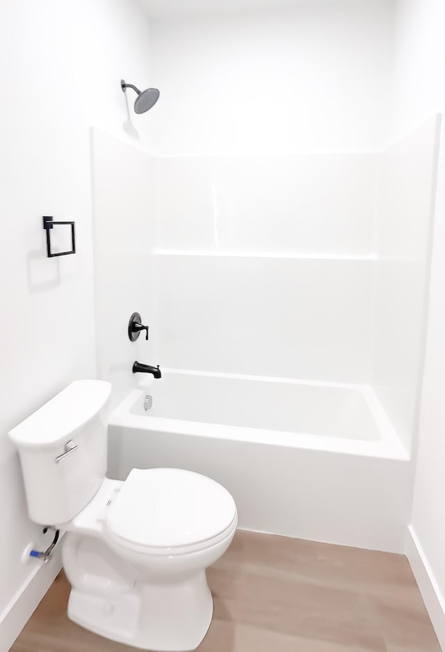 634 N Green Riv, Gaffney, SC 29341 - bathroom with washtub / shower combination and wood finished floors