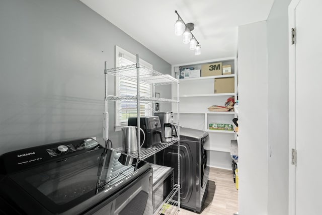 1142 Cooper Brg, Woodruff, SC 29388 - laundry room featuring washer and clothes dryer and light wood-style flooring