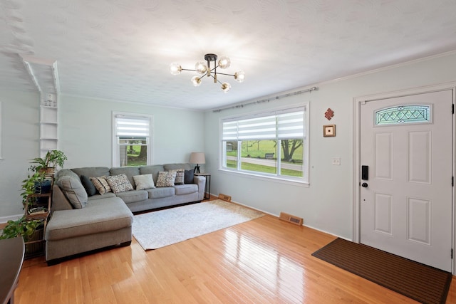 1142 Cooper Brg, Woodruff, SC 29388 - living room with a chandelier and wood finished floors