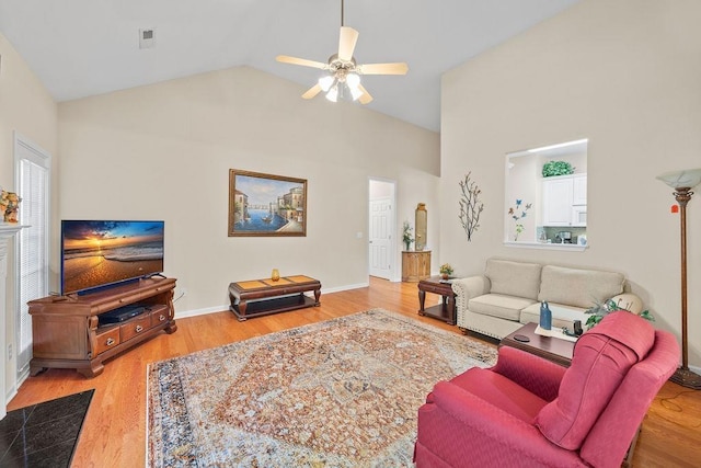 232 N Hamlet, Moore, SC 29369 - living room featuring a ceiling fan, wood finished floors, and high vaulted ceiling