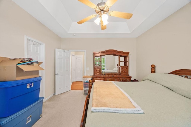 232 N Hamlet, Moore, SC 29369 - bedroom featuring a raised ceiling, light carpet, and a ceiling fan