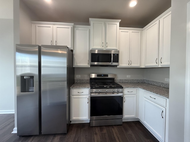 158 Clingstone, Duncan, SC 29334 - kitchen with appliances with stainless steel finishes, white cabinets, dark wood-style flooring, and recessed lighting