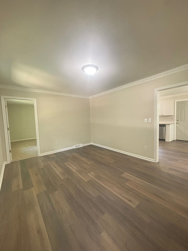 201 Bent Creek Dr, Greer, SC 29650 - spare room with ornamental molding and dark wood-type flooring