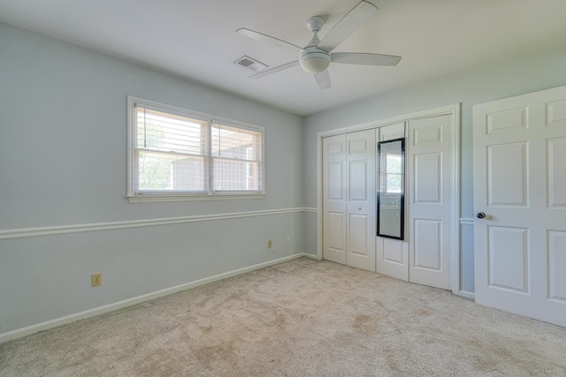 233 Summerfield, Moore, SC 29369 - unfurnished bedroom featuring multiple windows, carpet flooring, a closet, and ceiling fan
