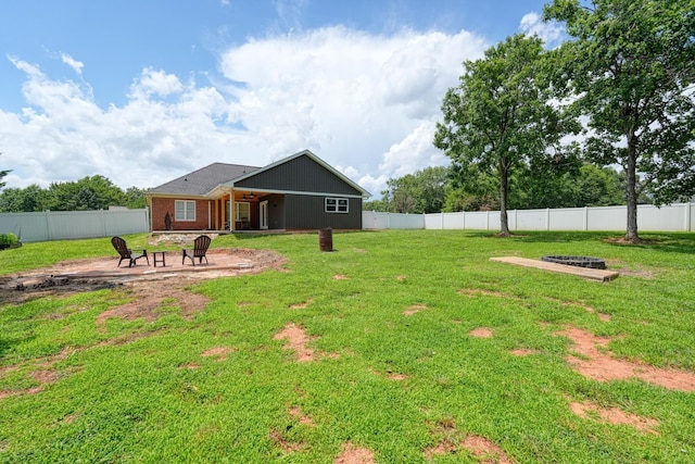233 Summerfield, Moore, SC 29369 - fenced backyard featuring a fire pit and a patio area
