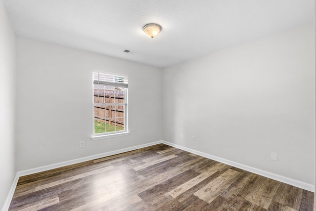 308 Juniper Leaf, Greer, SC 29651 - empty room with wood finished floors and baseboards