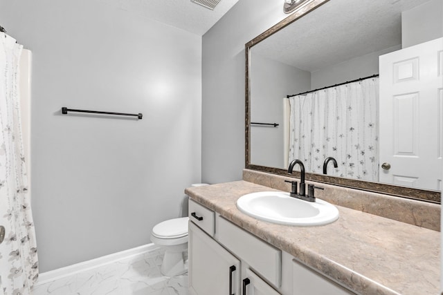 308 Juniper Leaf, Greer, SC 29651 - bathroom featuring vanity, a textured ceiling, and marble finish floors