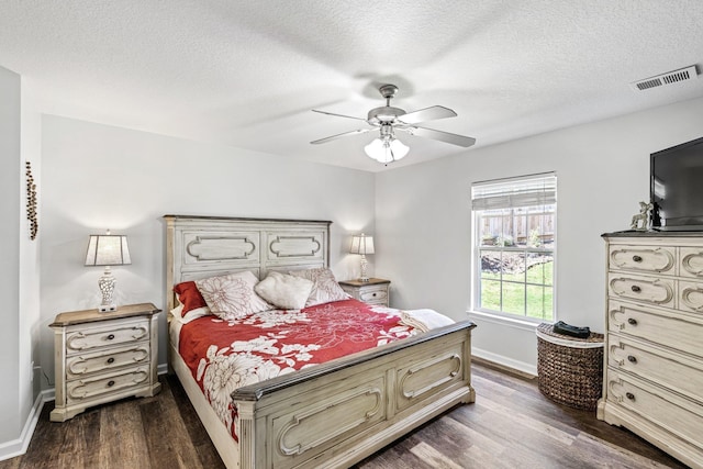 308 Juniper Leaf, Greer, SC 29651 - bedroom featuring dark wood-style floors, a textured ceiling, and a ceiling fan