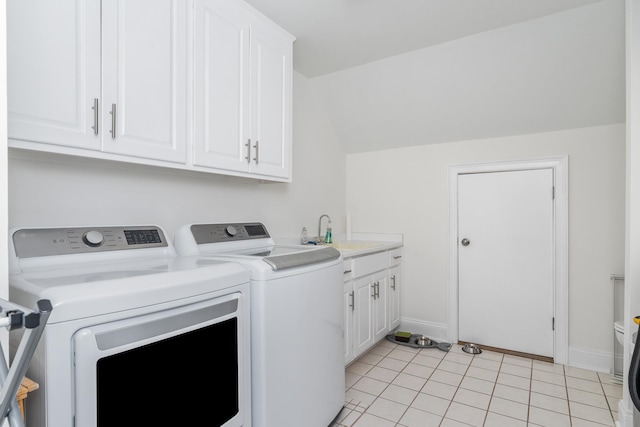 403 Barrington Park, Greer, SC 29650 - laundry room featuring washing machine and dryer, cabinet space, and light tile patterned floors