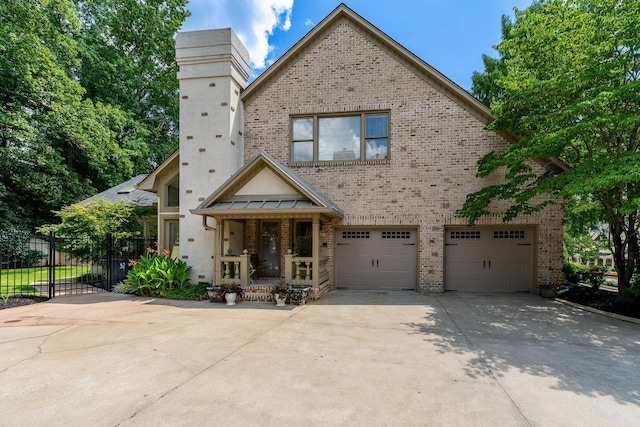 403 Barrington Park, Greer, SC 29650 - view of front of house with brick siding, driveway, a chimney, and an attached garage