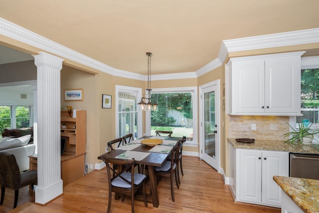 403 Barrington Park, Greer, SC 29650 - dining space with light wood-type flooring, healthy amount of natural light, crown molding, and decorative columns