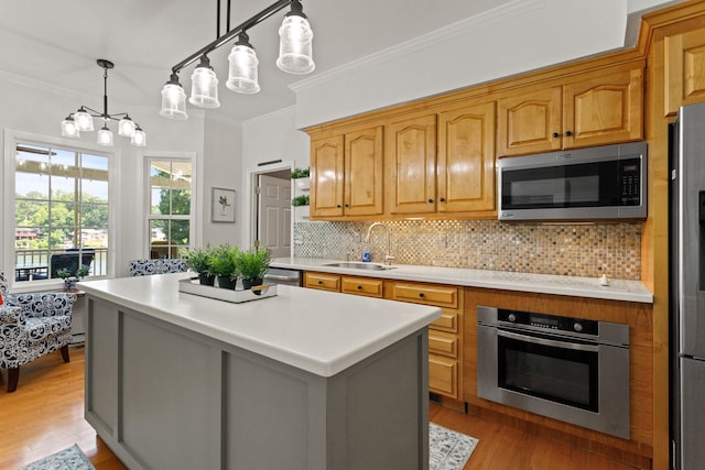 436 S Lakeview, Duncan, SC 29334 - kitchen with appliances with stainless steel finishes, backsplash, light wood finished floors, light countertops, and ornamental molding