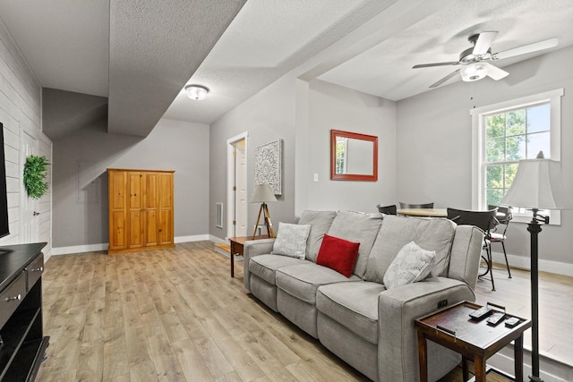 436 S Lakeview, Duncan, SC 29334 - living room featuring light wood finished floors, ceiling fan, and a textured ceiling