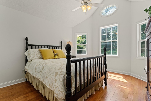 436 S Lakeview, Duncan, SC 29334 - bedroom featuring wood finished floors, high vaulted ceiling, and ceiling fan