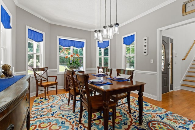 436 S Lakeview, Duncan, SC 29334 - dining area with stairs, light wood finished floors, crown molding, and a textured ceiling