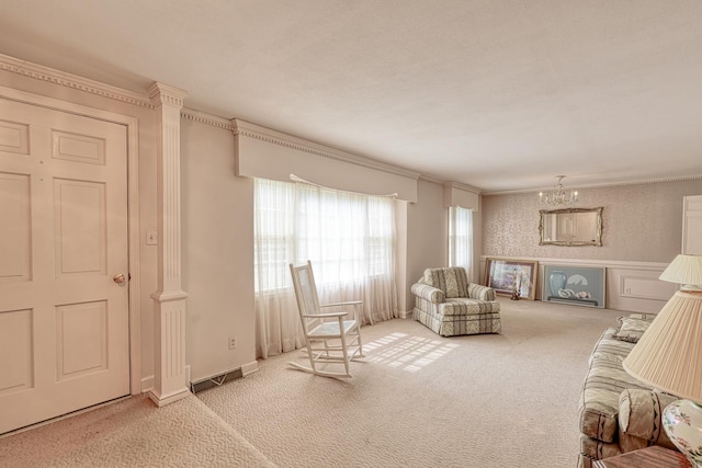 104 Pine, Laurens, SC 29360 - carpeted living area with a chandelier, ornamental molding, and a wainscoted wall
