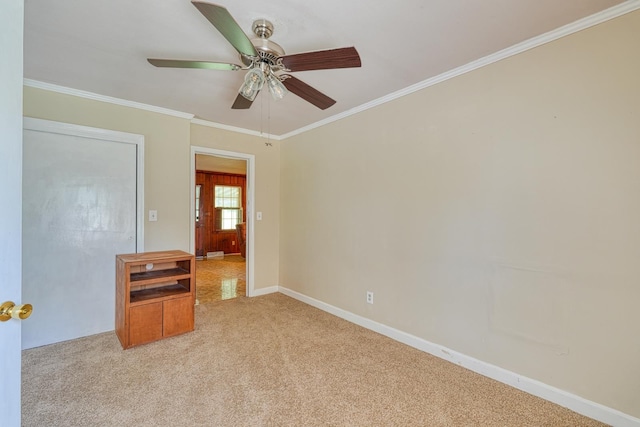 104 Pine, Laurens, SC 29360 - unfurnished room featuring light colored carpet, ceiling fan, and ornamental molding