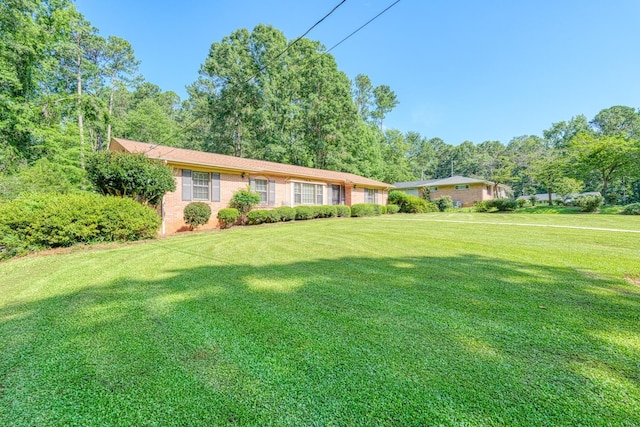 104 Pine, Laurens, SC 29360 - single story home featuring a front lawn