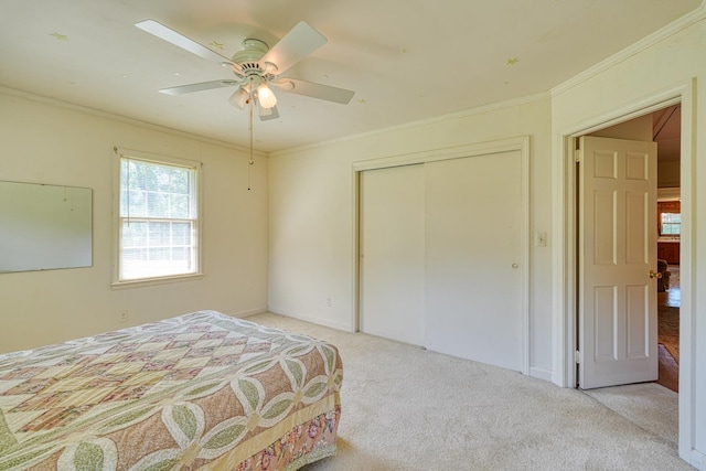 104 Pine, Laurens, SC 29360 - carpeted bedroom featuring a closet, ornamental molding, and ceiling fan