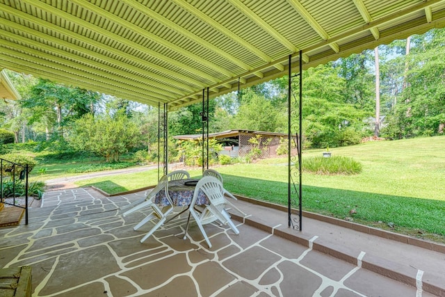 104 Pine, Laurens, SC 29360 - view of patio / terrace with view of wooded area