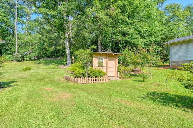 104 Pine, Laurens, SC 29360 - view of green lawn featuring an outbuilding and view of scattered trees