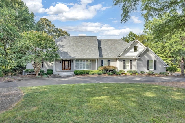 207 Carolina Club Dr, Spartanburg, SC 29306 - view of front of property with a front yard, asphalt driveway, and roof with shingles