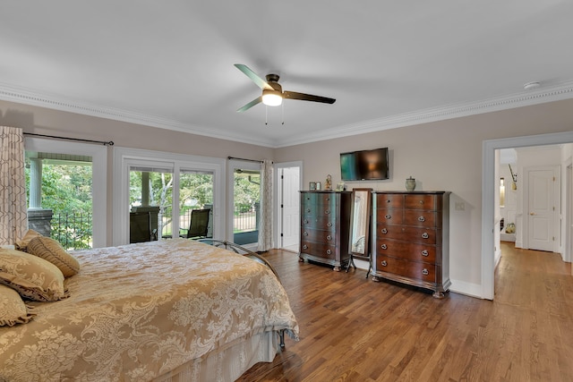 207 Carolina Club Dr, Spartanburg, SC 29306 - bedroom with access to exterior, ornamental molding, multiple windows, wood finished floors, and ceiling fan