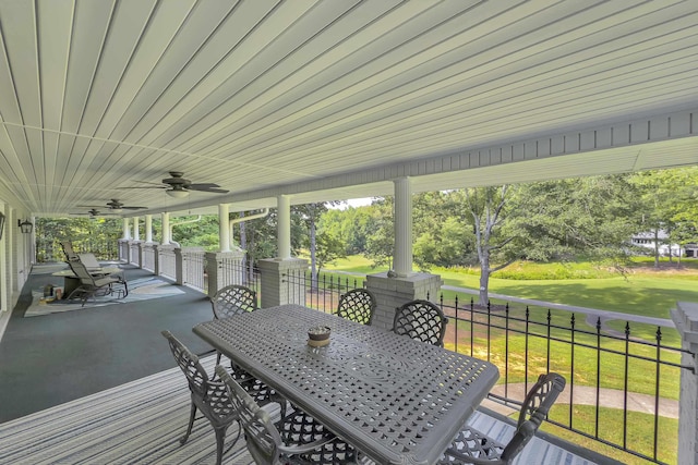 207 Carolina Club Dr, Spartanburg, SC 29306 - deck with outdoor dining space, a yard, and ceiling fan