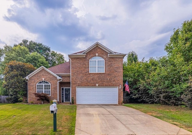 746 Tinder Box, Boiling Springs, SC 29349 - traditional-style house featuring brick siding, a garage, concrete driveway, and a front yard