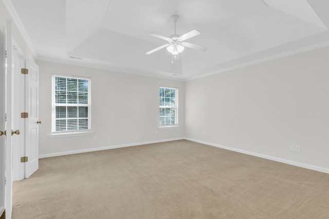 8 Glenbow, Simpsonville, SC 29680 - empty room with a tray ceiling, light colored carpet, ornamental molding, and ceiling fan