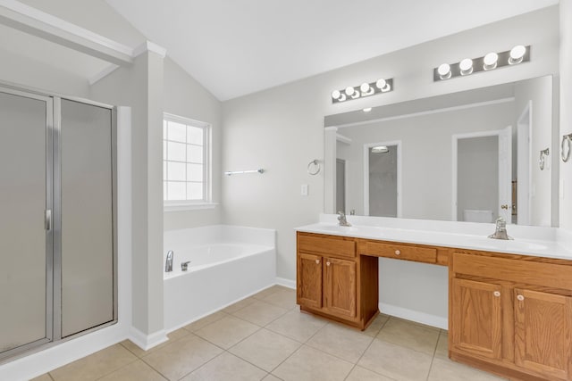 8 Glenbow, Simpsonville, SC 29680 - full bathroom featuring vaulted ceiling, a shower stall, a garden tub, double vanity, and tile patterned flooring