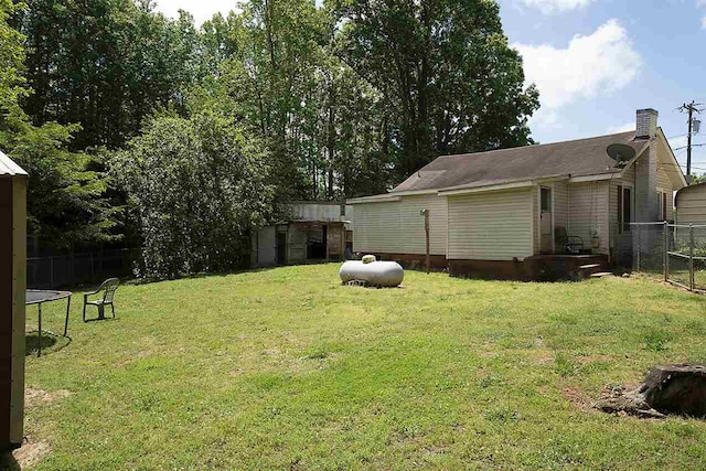 view of yard with a trampoline