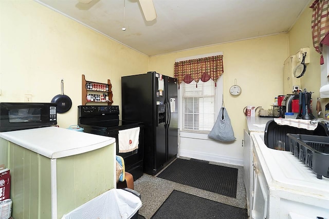 kitchen with ceiling fan and black appliances