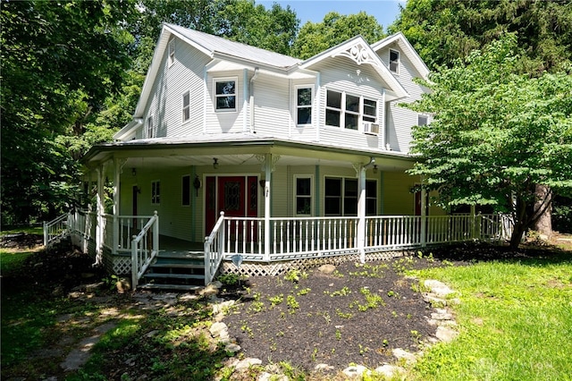 view of front facade featuring a porch and cooling unit