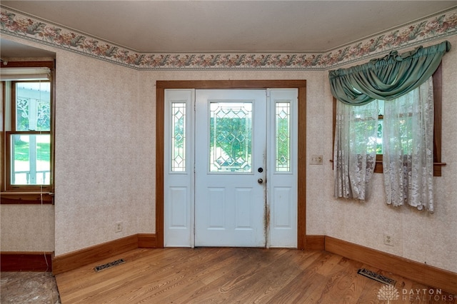 entrance foyer with hardwood / wood-style floors