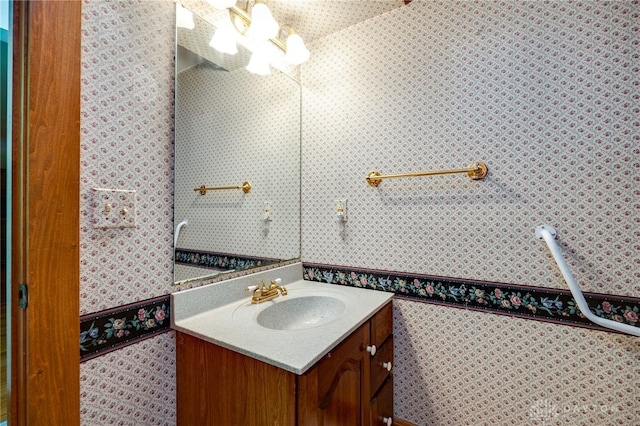 bathroom with vanity, tile patterned floors, and tile walls