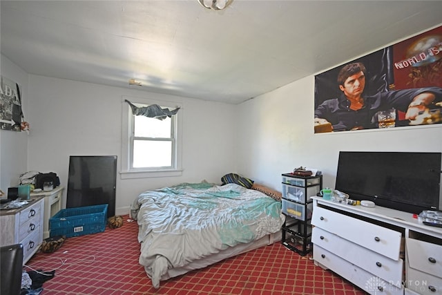 bedroom with dark carpet