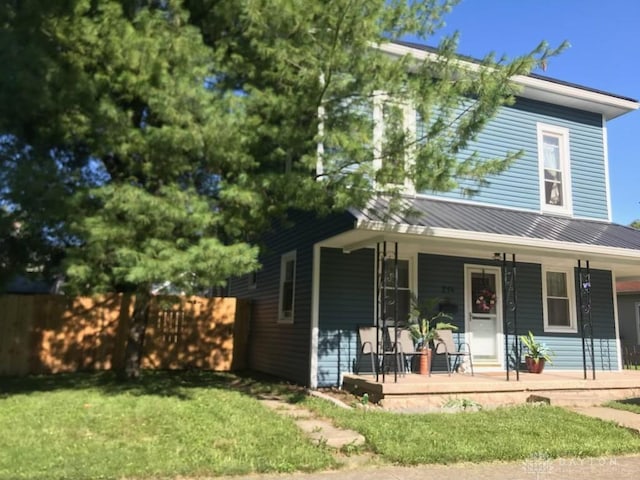 216 S Short St, Troy, OH 45373 - view of front facade with a porch, metal roof, and a standing seam roof