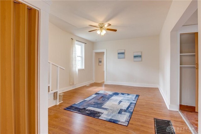 216 S Short St, Troy, OH 45373 - foyer entrance featuring a ceiling fan, light wood-style floors, and baseboards