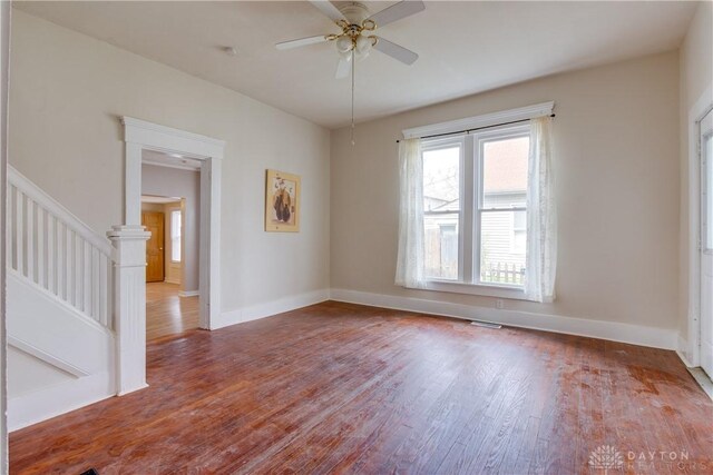 216 S Short St, Troy, OH 45373 - empty room featuring wood finished floors, plenty of natural light, and baseboards