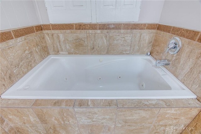 216 S Short St, Troy, OH 45373 - bathroom featuring a whirlpool tub