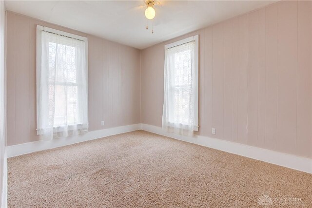 216 S Short St, Troy, OH 45373 - carpeted spare room featuring plenty of natural light, a ceiling fan, and baseboards